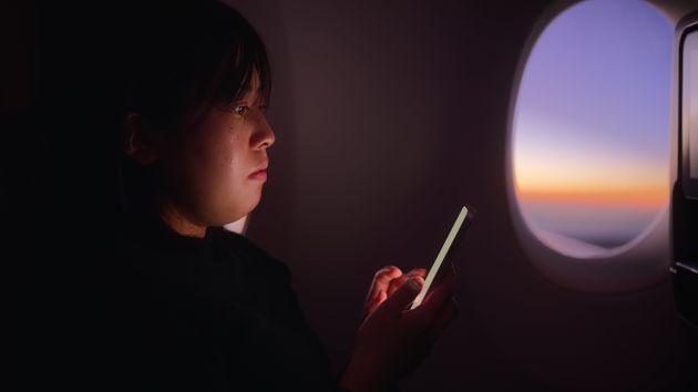 The Crucial Reason Why Lights Are Dimmed During A Flight