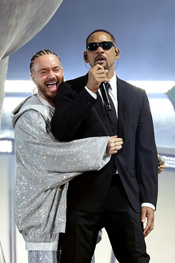 J Balvin, left, embraced Smith during the unexpected duet. 