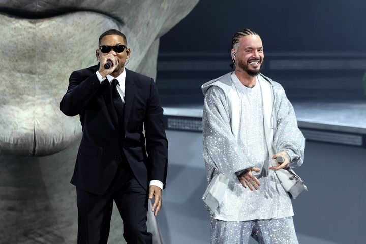 Will Smith, left, made a surprise appearance alongside Colombian superstar J Balvin at the Coachella music festival Sunday. 