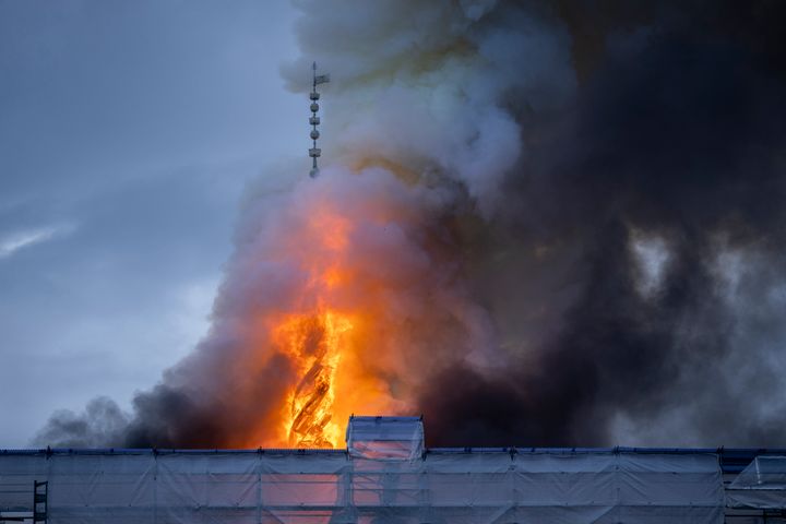 Huge billows of smoke rose over downtown Copenhagen and people were seen rushing inside the building to save paintings.