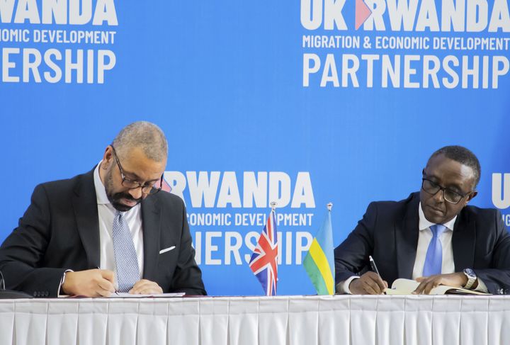 James Cleverly and Rwandan Foreign Minister Vincent Biruta sign a new deal on a reworked asylum scheme in Kigali, Rwanda on December 05, 2023. 