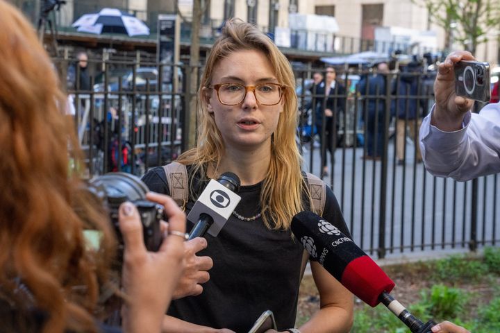Dismissed juror Kara McGee speaks to the media Tuesday in New York City.