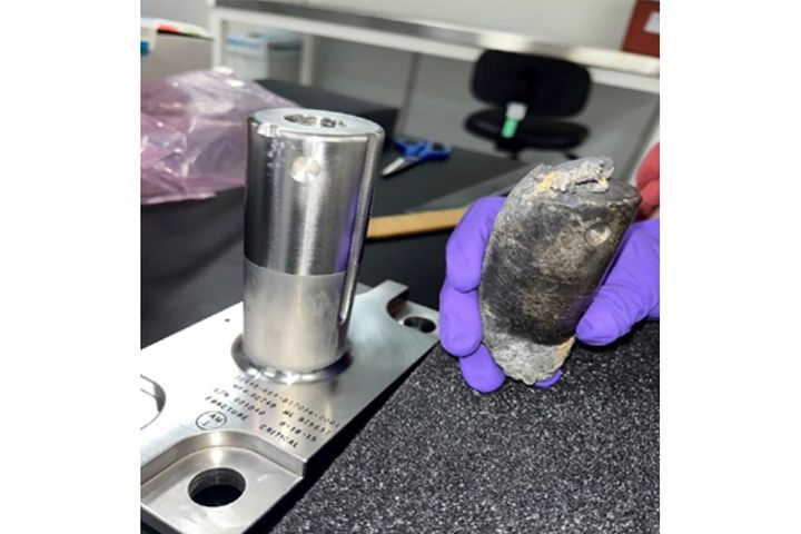 This undated photo provided by NASA shows a recovered chunk of space junk from equipment discarded at the International Space Station. The cylindrical object that tore through a home in Naples, Florida, on March 8 was subsequently taken to the Kennedy Space Center in Cape Canaveral, Florida, for analysis.