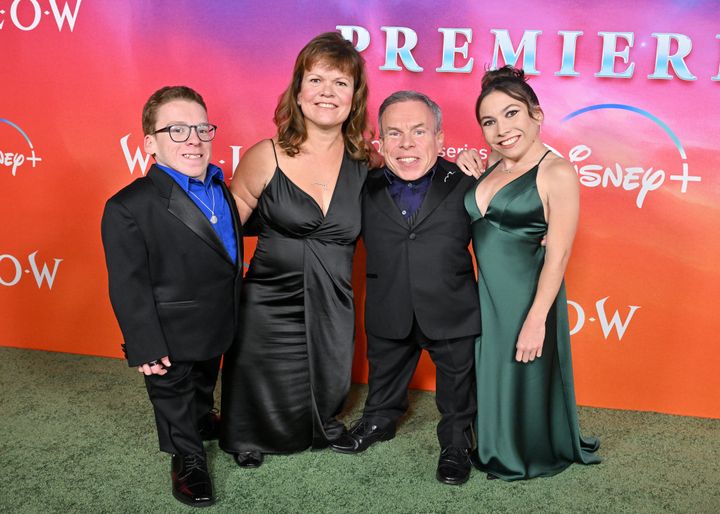 Warwick Davis, second from right, and Samantha Davis, second from left, attend the "Willow" premiere on Nov. 29, 2022, in Los Angeles with their children, Harrison and Annabelle Davis.