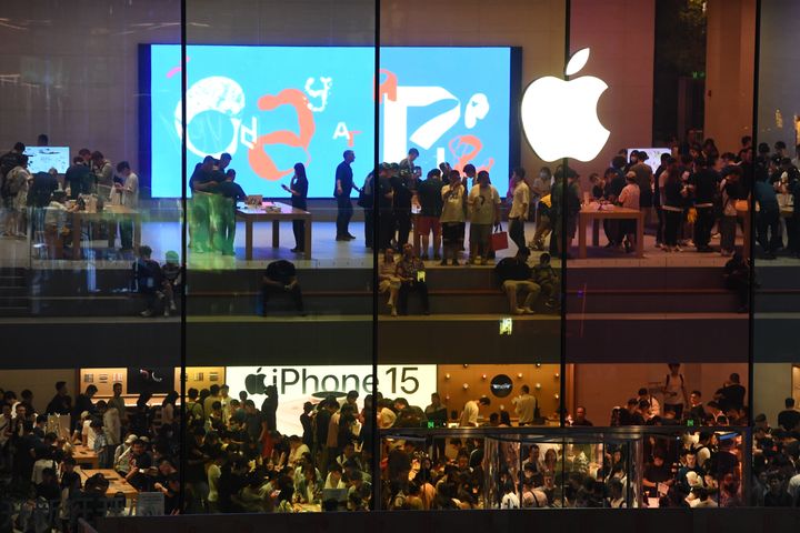Customers crowd the Sanlitun Apple store during the first day of sale of the iPhone 15 series smartphones on Sept. 22, 2023, in Beijing, China. 