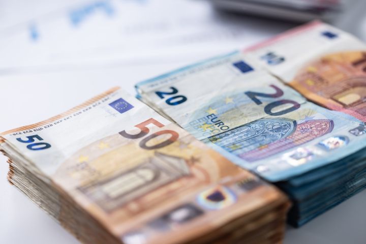 Euro currency. Banknotes stacked on each other in different positions.Several hundred euro banknotes stacked by value
