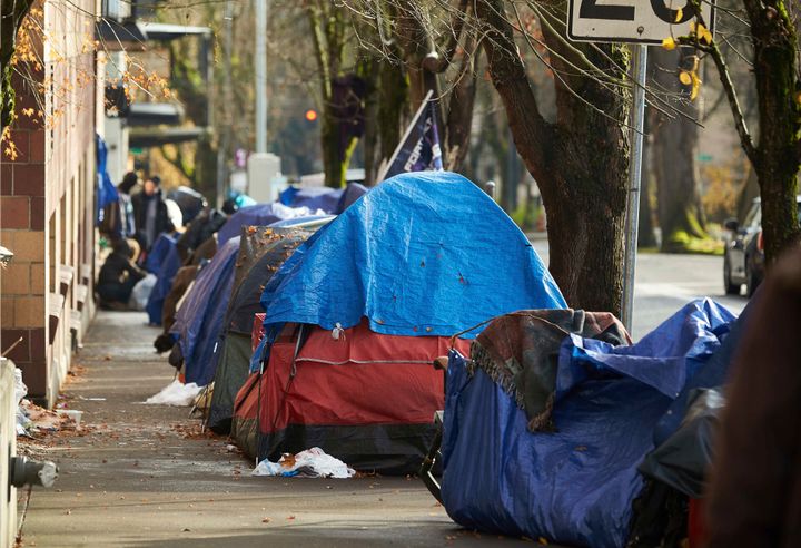 Tents line the sidewalk on Clay Street in Portland, Oregon, in 2020.