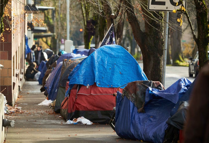 Tents line the sidewalk on Clay Street in Portland, Oregon, in 2020.