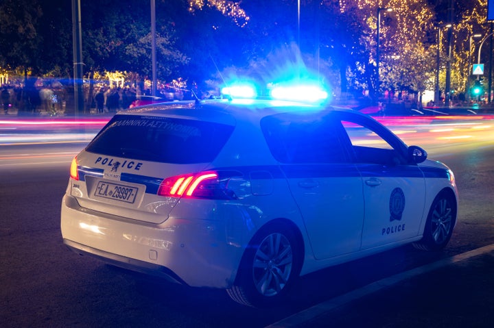 25 December 2023, Athens, Greece: This is a photo of a Greek police force car at night.