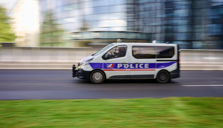 Blurred police car on roadparis, france, april 18, 2024