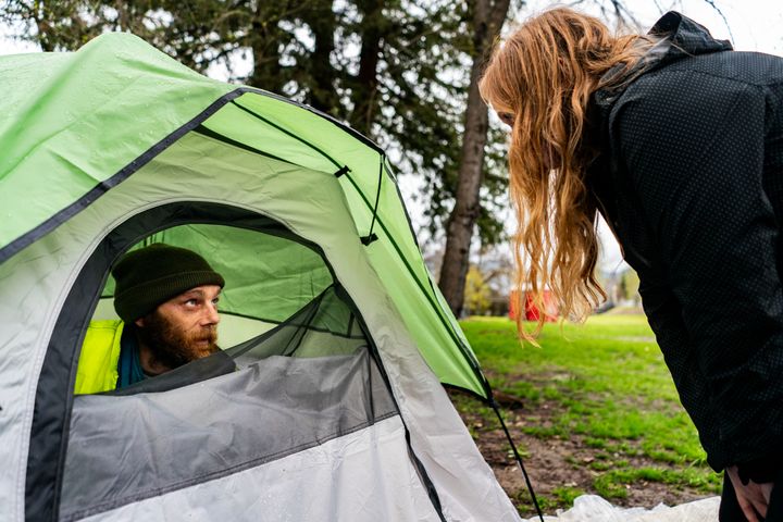 Advocates inform homeless residents of Grants Pass, Oregon, about a sweep removing their tents as they city cracks down on outdoor sleeping.