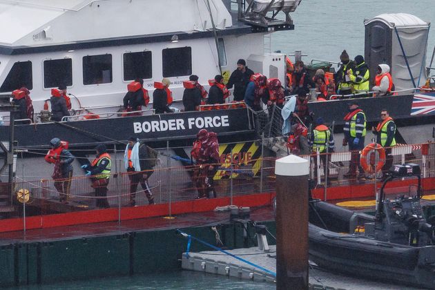 Migrants are brought ashore after being picked up in the English Channel by a Border Force vessel on November 16, 2023 