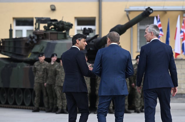 Rishi Sunak with Nato general secretary Jens Stoltenberg and Polish prime minister Donald Tusk in Warsaw.