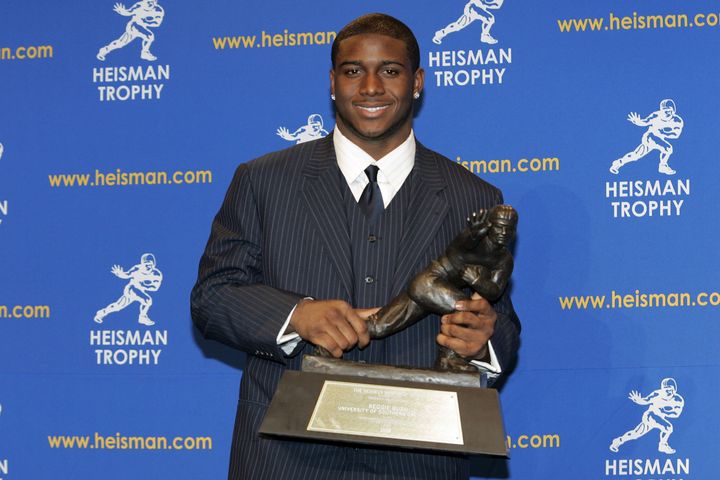 Reggie Bush photographed holding the Heisman Trophy during the 2005 Heisman Trophy ceremony in New York City on December 10, 2005. The Heisman Trophy Trust announced on April 24, 2024 that Bush has been reinstated as the 2005 Heisman trophy winner.