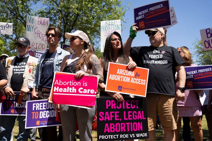 Members of Arizona for Abortion Access, the ballot initiative to enshrine abortion rights in the Arizona State Constitution, hold a press conference and protest April 17.