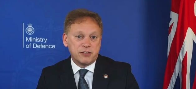 Exclusive: Grant Shapps Uses MoD Backdrop When He's Actually
Broadcasting From Home