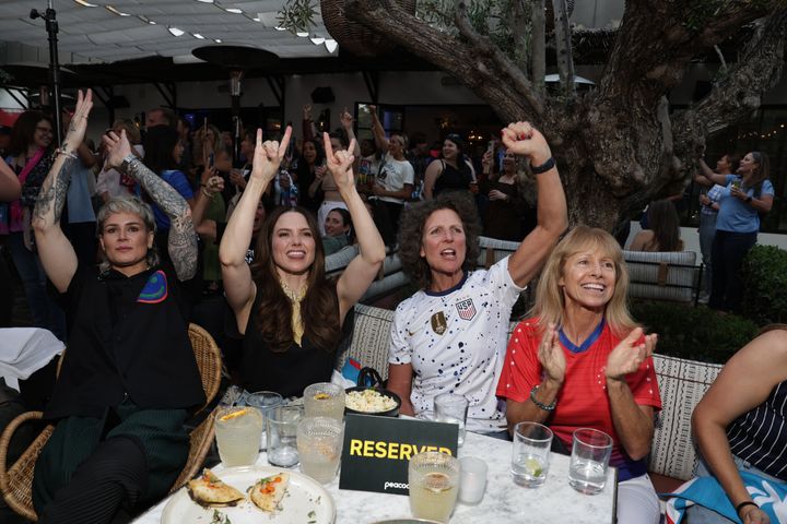 Ashlyn Harris, Sophia Bush, Michelle Akers, Linda Gancitano Gracias Madre watch a soccer match at Peacock watch party in 2021.