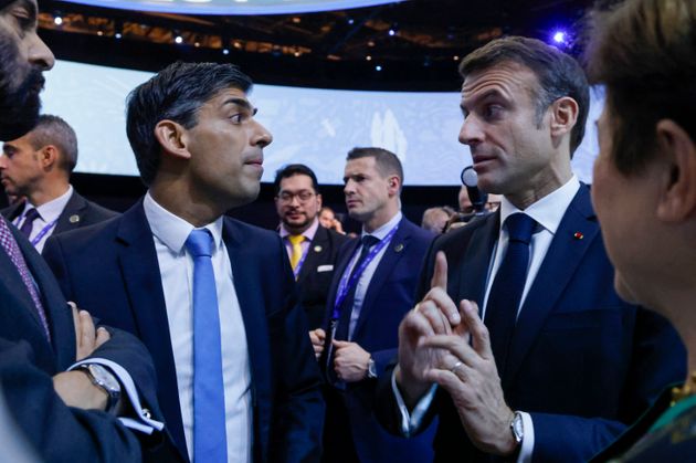Emmanuel Macron with Rishi Sunak during the Transforming Climate Finance session at the United Nations climate summit in Dubai last December.