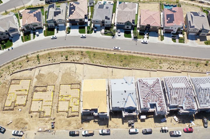 An aerial view of existing homes near new homes under construction in the Chatsworth neighborhood on Sept. 8, 2023, in Los Angeles, California.