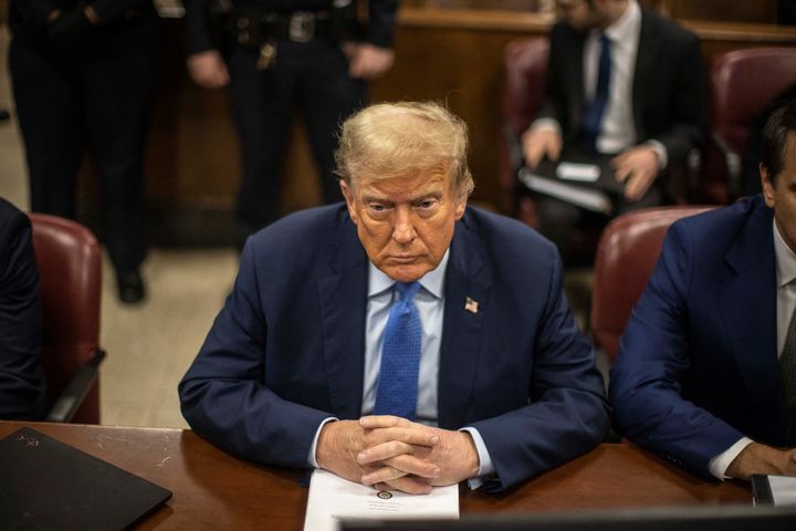 Donald Trump attends his trial for allegedly covering up hush money payments linked to extramarital affairs, at Manhattan Criminal Court in New York City on April 26, 2024. (Photo by Dave Sanders / POOL / AFP)