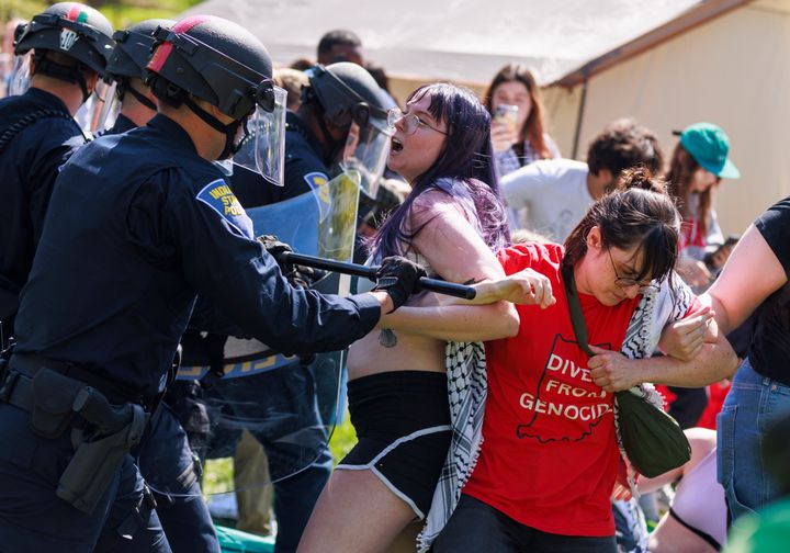 Dozens of people are arrested by the Indiana State Police riot squad during a pro-Palestinian protest on campus. The protesters had set up an encampment, and police told them to take down the tents or they would clear the area by force and arrest anybody who didn't leave.
