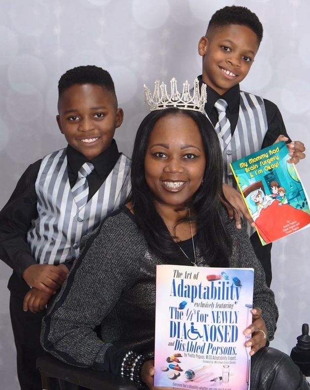 The author and her sons pose with books they wrote after she became disabled.