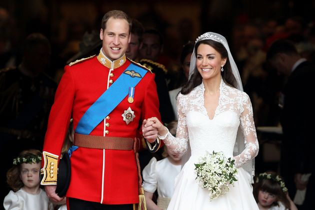 The then-Duke and Duchess of Cambridge smile following their marriage at Westminster Abbey on April 29, 2011, in London.