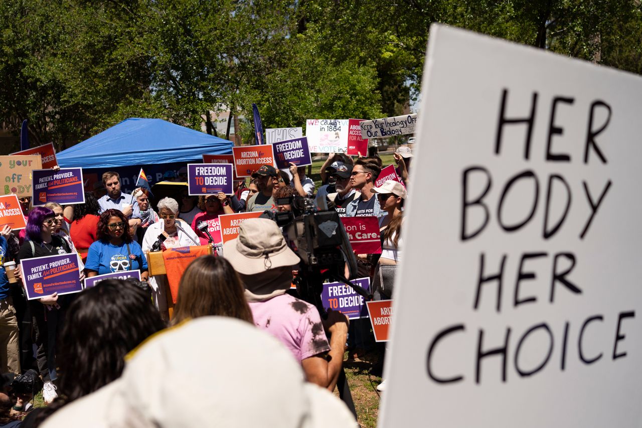 Members of Arizona for Abortion Access hold a news conference on April 17 in Phoenix to condemn Arizona House Republicans and a state Supreme Court ruling implementing a 1864 law with a near total ban on abortion.