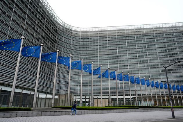 European Union flags flap in the wind outside EU headquarters in Brussels, Friday, April 5, 2024. (AP Photo/Virginia Mayo)