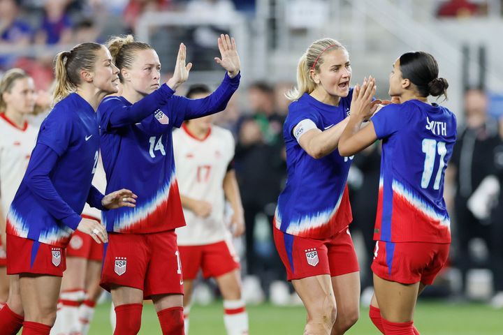 United States' Sophia Smith, right, celebrates her goal against Canada with teammates during the shoot out of a SheBelieves Cup women's soccer match on April 9, 2024, in Columbus, Ohio. 
