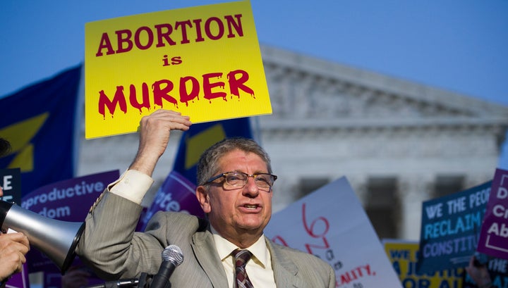 Operation Rescue founder Randall Terry protests in front of the Supreme Court in Washington on July 9, 2018.