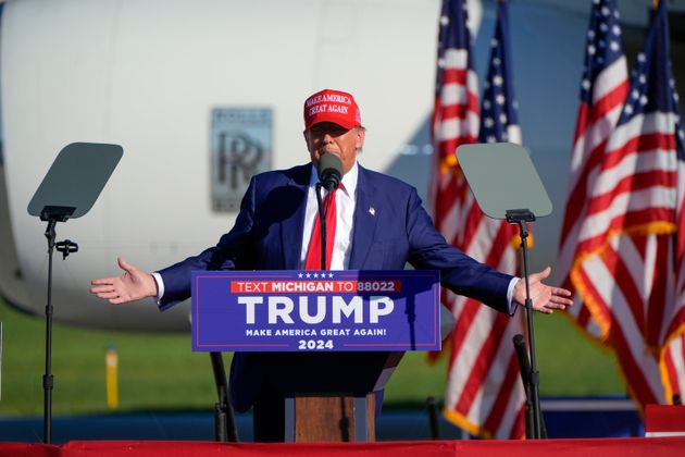 Donald Trump speaks at a campaign rally in Freeland, Michigan, on his day off from court.