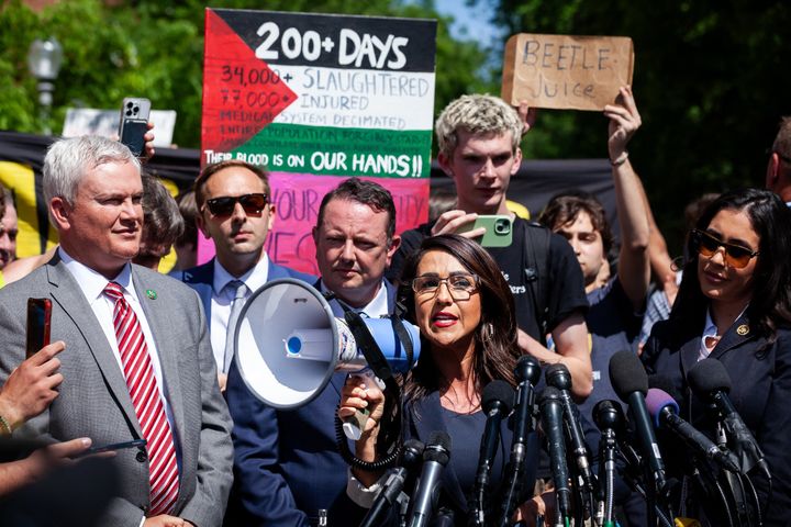 Rep. Lauren Boebert used a bullhorn during a press conference at the George Washington University Gaza encampment. Hundreds of students opposed to the far-right Republicans who visited the camp chanted over and frequently drowned out the members of Congress. 