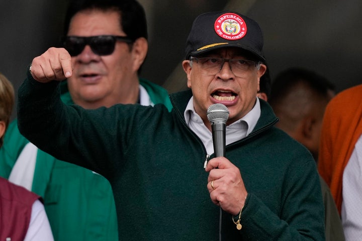 Colombian President Gustavo Petro addresses people at the International Workers' Day march in Bogota, Colombia, Wednesday, May 1, 2024. (AP Photo/Fernando Vergara)