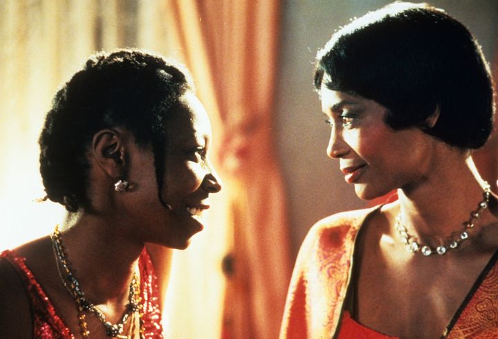 Whoopi Goldberg smiles with Margaret Avery in a scene from the film "The Color Purple."