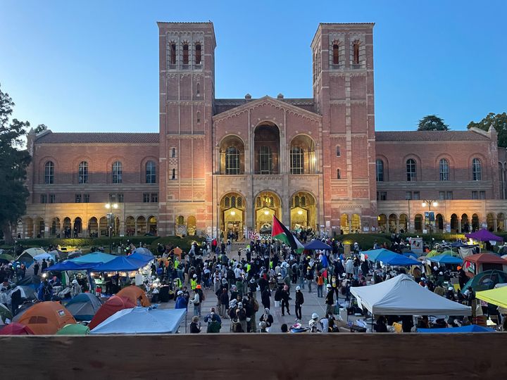 An encampment of people protesting Israel's attacks on Gaza is set up on the UCLA campus by Royce Hall.