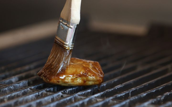 A piece of Good Meat's cultivated chicken is seen cooking on a grill in Alameda, California