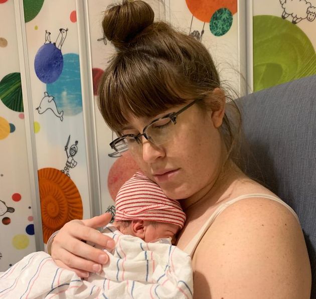 The author and her son in the NICU shortly after giving birth.