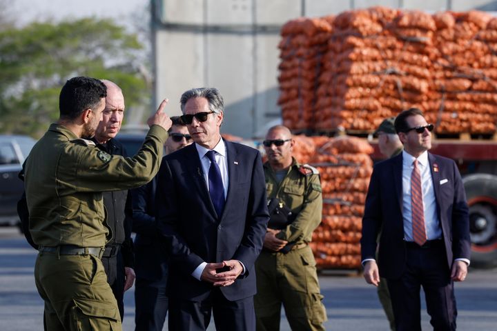 U.S. Secretary of State Antony Blinken walks with Israeli Defense Minister Yoav Gallant, at the Kerem Shalom border crossing, Israel, May 1, 2024. (Evelyn Hockstein/Pool Photo via AP)