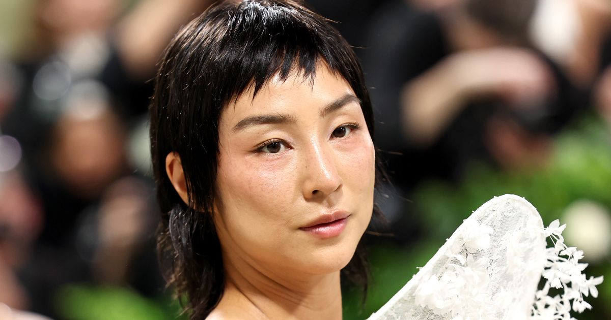 Watch Greta Lee Realize In Real Time That She Can’t Talk Or Eat In Met Gala Gown