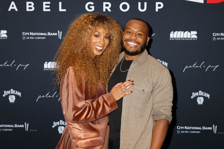 Tiera Kennedy, left, with husband Kamren Kennedy at the 2023 CMA Awards. 