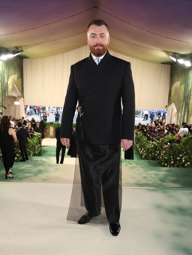 Sam pictured on their own outside the Met Gala