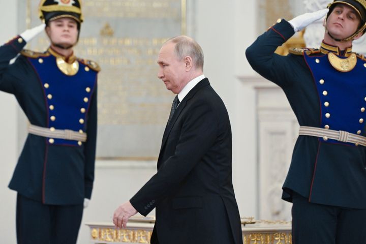 Russian President Vladimir Putin arrives at a ceremony to present medals on the eve of Heroes of the Fatherland Day at St. George Hall of the Grand Kremlin Palace, in Moscow, Russia, on Dec. 8, 2023.