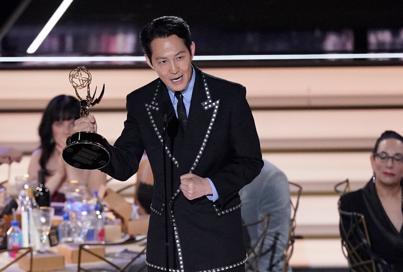 Lee Jung-Jae accepts the Emmy for Outstanding Lead Actor in a Drama Series for "Squid Game" at the 74th Primetime Emmy Awards on Monday, Sept. 12, 2022, at the Microsoft Theater in Los Angeles.