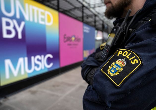 Police patrol the area outside the Malmö Arena, where Eurovision is taking place in 2024