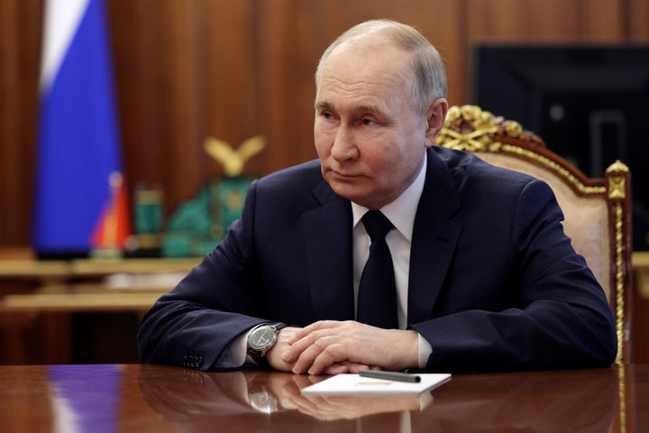 Russian President Vladimir Putin, right, listens to Mikhail Mishustin, the candidate for the post of Russian Prime Minister during their meeting at the Kremlin in Moscow, Russia, Friday, May 10, 2024. (Gavriil Grigorov, Sputnik, Kremlin Pool Photo via AP) qhxidiqxkiqtkinv