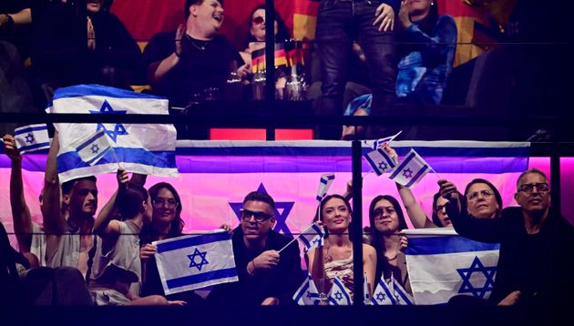 Israeli singer Eden Golan pictured with members of her delegation on Saturday night