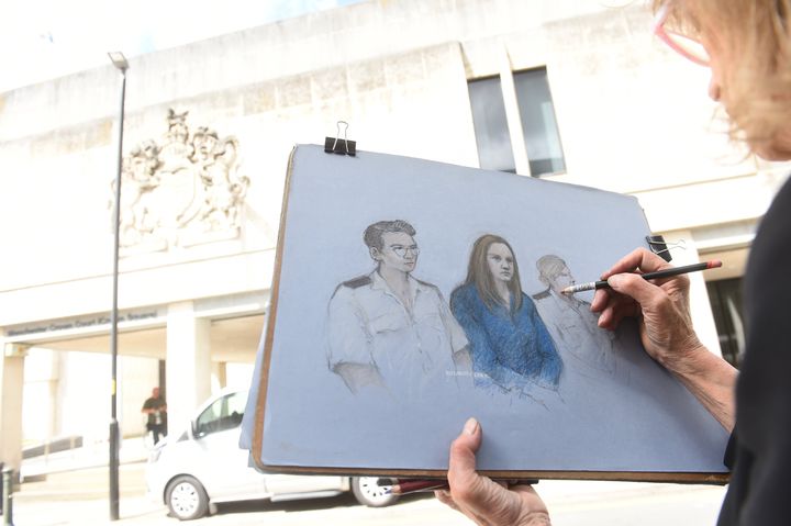 Court artist Elizabeth Cook draws outside Manchester Crown Court before a verdict is read on Aug. 11, 2023, in the case of nurse Lucy Letby, who was found guilty of killing seven babies.