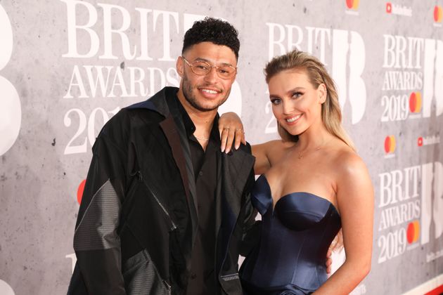 Alex Oxlade-Chamberlain and Perrie Edwards at the Brits in 2019