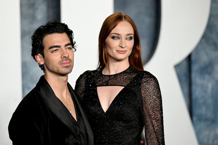 Joe Jonas, left, and Sophie Turner attend the Vanity Fair Oscar Party in March 2023. Turner has addressed their divorce for the first time in a recent interview.